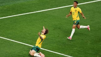 Socceroos kick-off World Cup with crucial victory